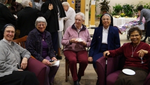 Sisters Enjoying a Gathering in the Lobby